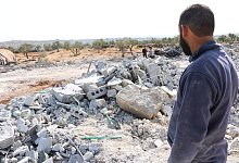 Tr&uuml;mmer - Foto: Mustafa Dahnon/dpa