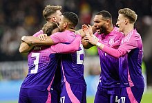 Heimsieg - Christian Charisius/dpa