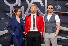 Die Schauspieler Ana de Armas (l-r), Ryan Gosling und Chris Evans bei Sondervorf&uuml;hrung des Films &laquo;The Gray Man&raquo; von Netflix in Berlin. - Monika Skolimowska/dpa