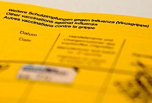 Vorsicht bei Impfpass-Fotos im Internet - Foto: Jens Kalaene/zb/dpa/Archivbild