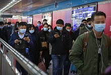 Fast ein Jahr Corona - Foto: Mark Schiefelbein/AP/dpa