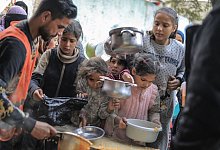 Essensausgabe - Mohammed Talatene/dpa