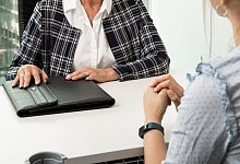 Berufliches Gespräch - Christin Klose/dpa-tmn