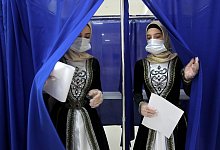 W&auml;hlerinnen in Russland - Foto: Musa Sadulayev/AP/dpa