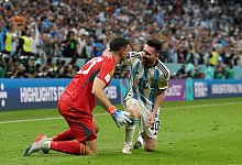 Martinez und Messi - Martin Rickett/PA Wire/dpa