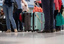 Passagiere - Foto: Tom Weller/dpa