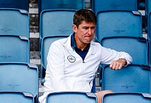 Der Kapit&auml;n der deutschen Davis-Cup-Mannschaft, Michael Kohlmann, sitzt auf einer Trib&uuml;ne. - Frank Molter/dpa