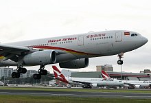 Hainan Airlines - Rob Griffith/AP/dpa