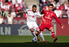 Linton Maina (l) - Marius Becker/dpa