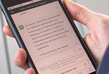Smartphone mit ChatGPT - Jessica Lichetzki/dpa