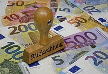 Stempel und Rueckzahlung - picture alliance / ZB