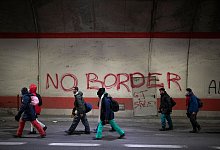 Migranten - Daniel Cole/AP/dpa