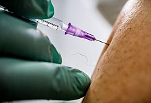 Corona-Impfung - Foto: Michael Kappeler/dpa