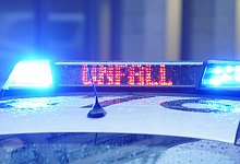 Polizeifahrzeug - Marcus Brandt/dpa