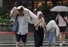 Taifun Danas über Taiwan - Chiang Ying-ying/AP/dpa