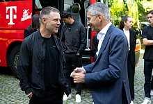 Alexander Straus und Herbert Hainer - Sven Hoppe/dpa