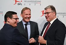 Oliver Leki, Hans-Joachim Watzke und Axel Hellmann - Arne Dedert/dpa