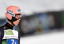 Karl Geiger - Foto: Darko Bandic/AP/dpa