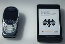 Merkel-Handy - Oliver Berg/dpa