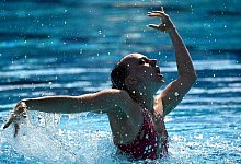 Synchronschwimmerin Marlene Bojer bei ihrer Kür. - Uncredited/AP/dpa