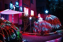 Weihnachtshaus mit Lichtshow in K&ouml;ln - Christoph Reichwein/dpa