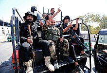 K&auml;mpfer von Saraya al-Salam (&laquo;Friedenskompanie&raquo;), dem milit&auml;rischen Fl&uuml;gel des schiitischen Geistlichen Al-Sadr. - Murtadha Ridha/AP/dpa