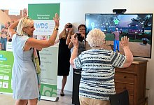 Tanzspiel vor der Spielkonsole - Foto: Uwe Zucchi