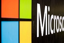 Das Microsoft-Firmenlogo in den B&uuml;ros in Sydney. Russland verliert mit Microsoft und Intel zwei der wichtigsten Zulieferer f&uuml;r seine Computer-Technik. - Rick Rycroft/AP/dpa