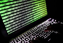 Cybercrime - Oliver Berg/dpa/Illustration