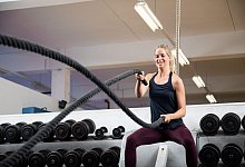 Eine Frau im Fitnessstudio - Christin Klose/dpa-tmn