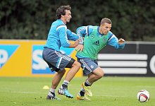 Lukas Podolski und Mats Hummels - Fredrik von Erichsen/dpa