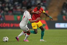 Guinea - Gambia - Sunday Alamba/AP