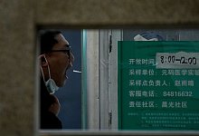 Coronavirus - China - Andy Wong/AP/dpa