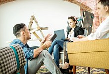 Kollegen im Meeting - Christin Klose/dpa-tmn