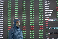 Coronavirus - Finanzm&auml;rkte - Foto: -/AP/dpa