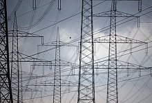 Strommasten - Federico Gambarini/dpa/Symbolbild