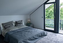 Ein Schlafzimmer in einem Haus - Laura Ludiwg/dpa-tmn