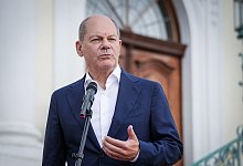 Bundeskanzler Olaf Scholz (SPD) vor Beginn der Klausur des Bundeskabinetts auf Schloss Meseberg. - Kay Nietfeld/dpa