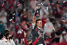 Triumph - Foto: Ashley Landis/AP/dpa