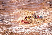 Touristen beim «Tidal Bore Rafting» - Patrick Rojo/Tourism Nova Scotia/dpa-tmn