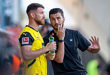 Salih &Ouml;zcan (l.) und Nuri Sahin. - David Inderlied/dpa