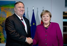 Mike Pompeo und Angela Merkel - Foto: Kay Nietfeld/dpa