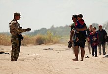 Flüchtlinge in den USAS - Eric Gay/AP/dpa