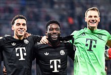 Jamal Musiala und Alphonso Davies - David Hammersen/dpa