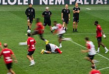 Die Mannschaft des 1. FC K&ouml;ln beim Abschlusstraining. - Marton Monus/dpa