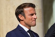 Pr&auml;sident Emmanuel Macron muss um die absolute Mehrheit in der Nationalversammlung bangen. Es geht darum, wie viele seiner Vorhaben er umsetzen kann. - Michel Euler/AP/dpa