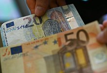 Falsche Euro-Banknoten - Arne Dedert/dpa