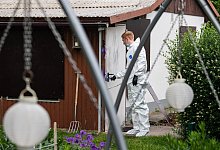 Polizei in der Kleingartenanlage - Foto: Guido Kirchner/dpa