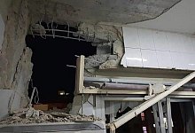 Besch&auml;digtes Geb&auml;ude bei Damaskus - Foto: -/AP/SANA/dpa