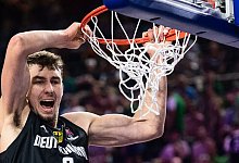 Erinert viele an den jungen Dirk Nowitzki: Franz Wagner punktet gegen Litauen. - Marius Becker/dpa